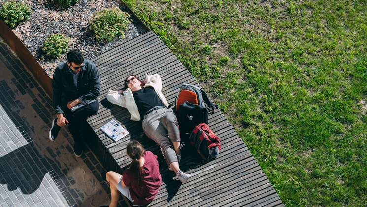 Students in Tartu sitting and lying down.